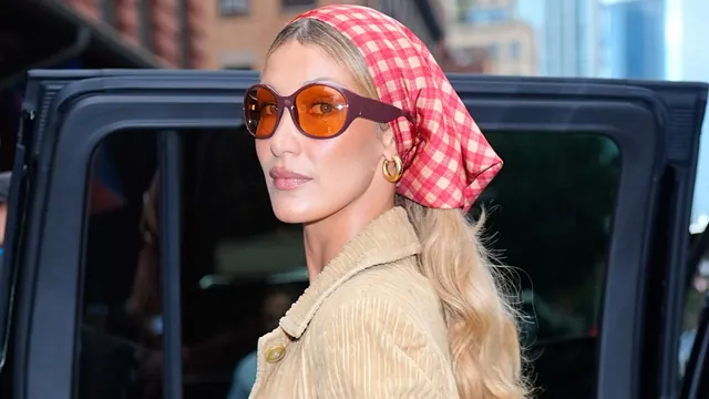 Bella Hadid’s Gingham Headscarf Carries Summer Picnic Vibes Into Fall