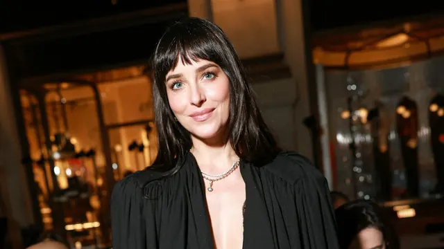 Valentino’s Updated Spike Bag Gets Its Shine On Dakota Johnson