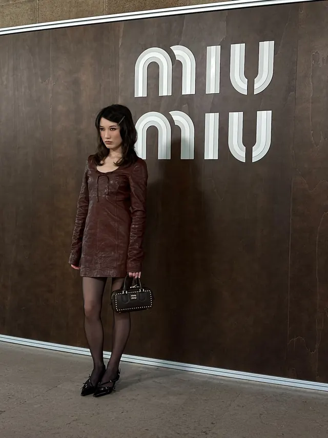 Attending Miu Miu SS27 With Ashley Rous